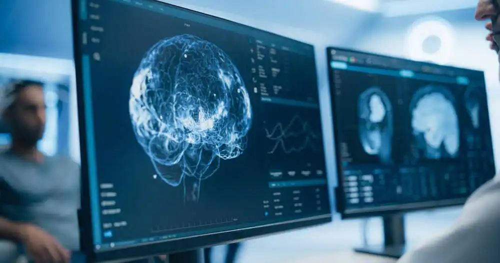 Health Maintenance vs. Health Optimization: Why Early Detection Changes Everything 1 Medical Brain Scans On Multiple Computer Screens Advanced Neuro imaging Technology