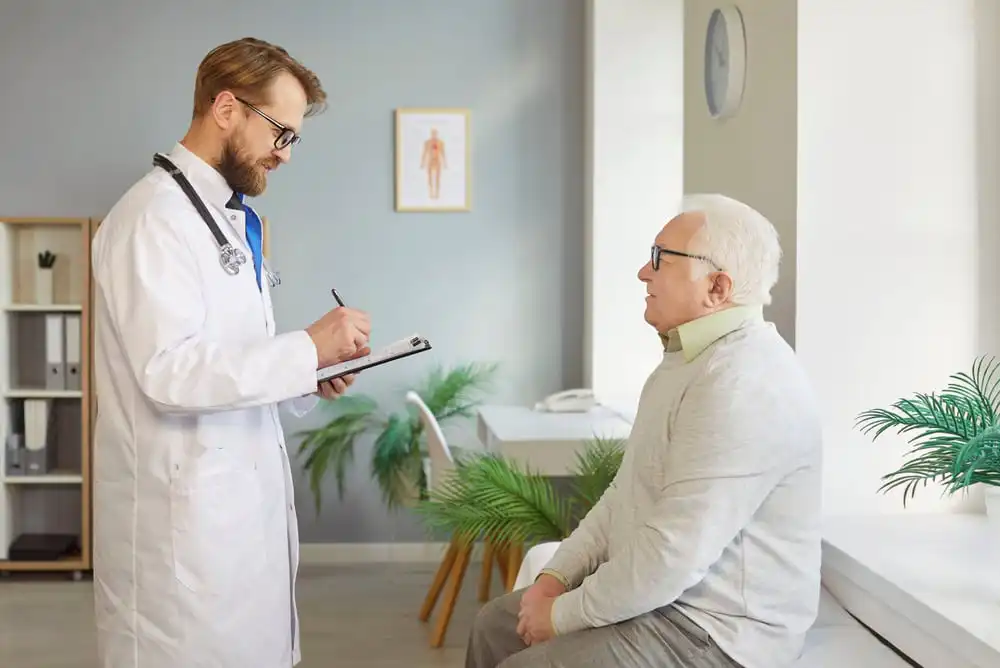 Patient Gets Consultation From Doctor - MRI Wellness Your annual dr. appointment may be different this year